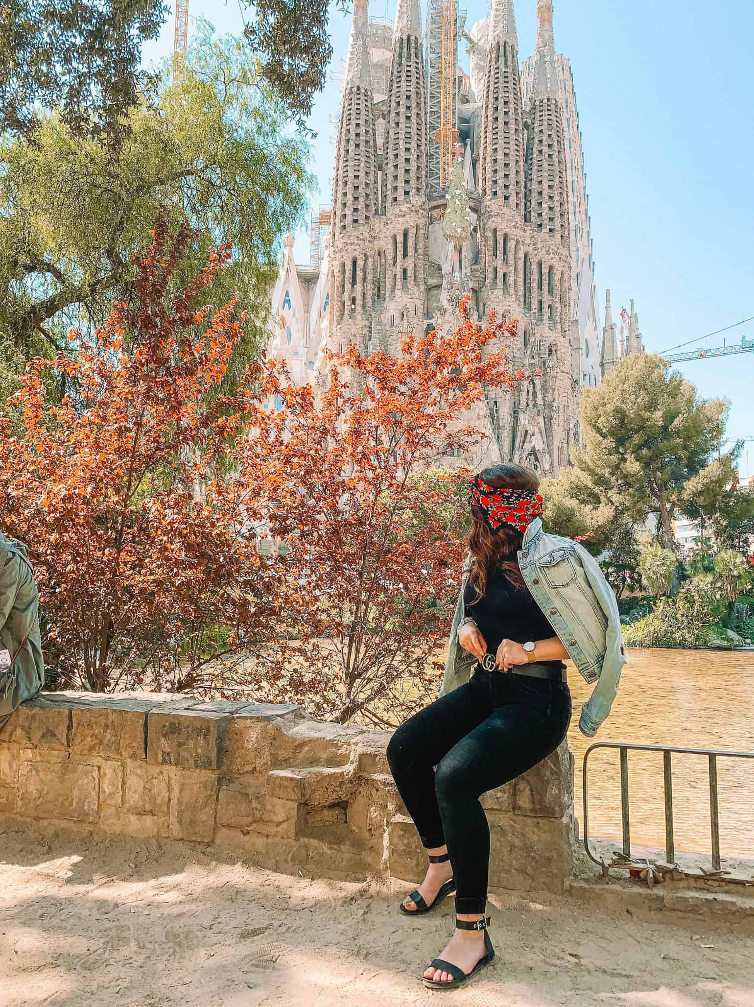 Me wearing my black jeggings in front of the Sagrada Familia in Barcelona. Black jeans are a must on the list of what to pack when studying abroad in Europe.