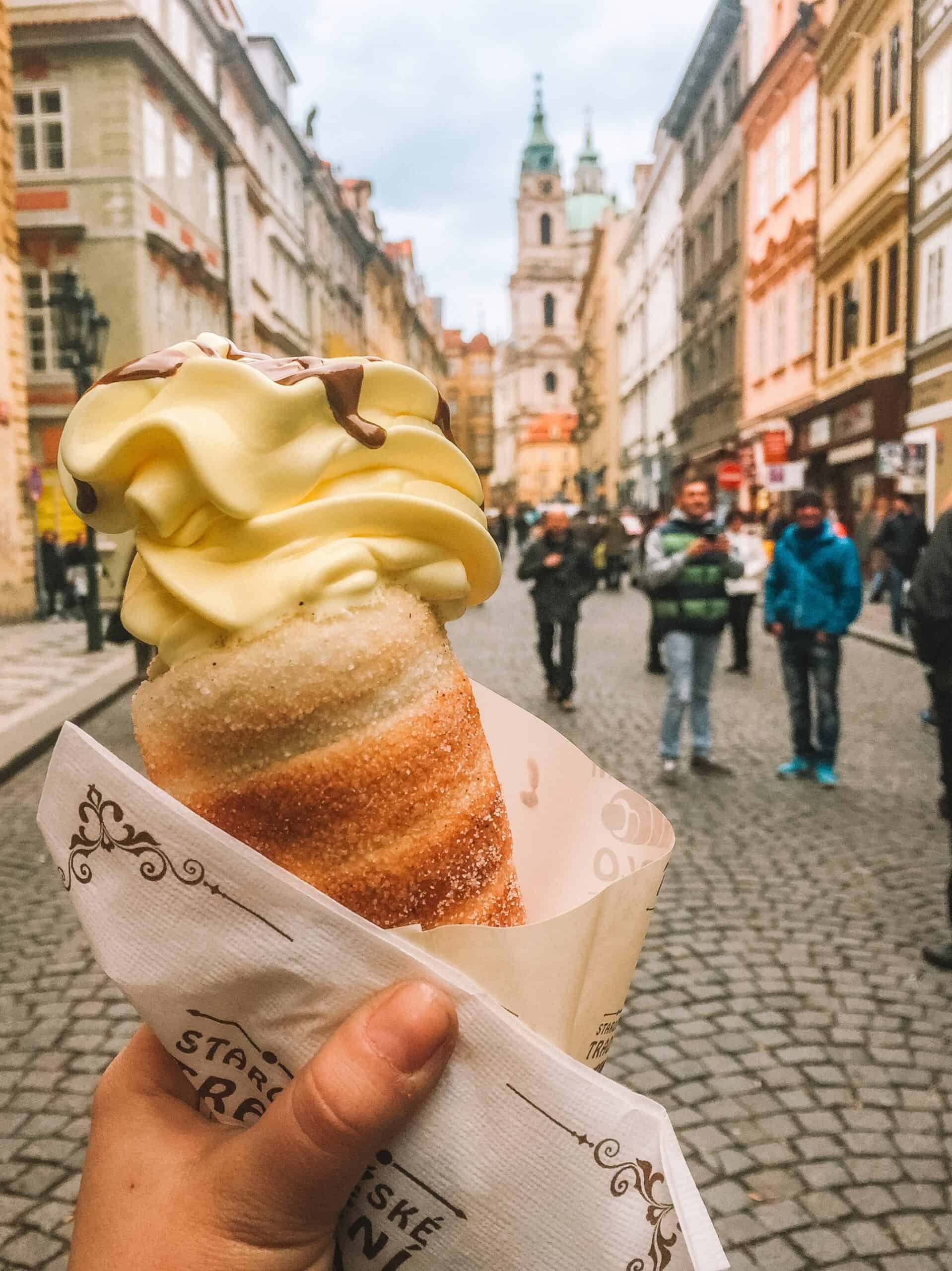 A tasty trdelník filled with soft serve ice cream.