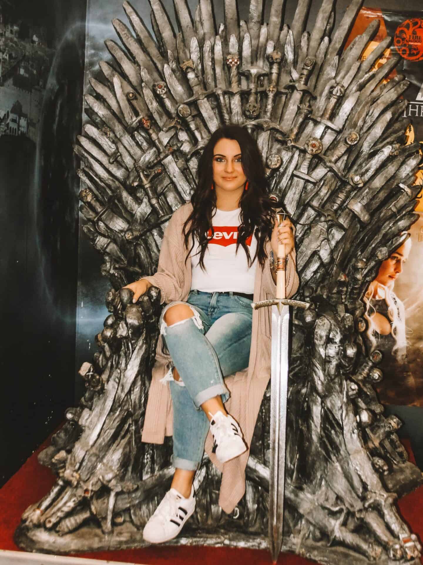 Madison sitting on the Iron Throne after the Game of Thrones Tour in Dubrovnik
