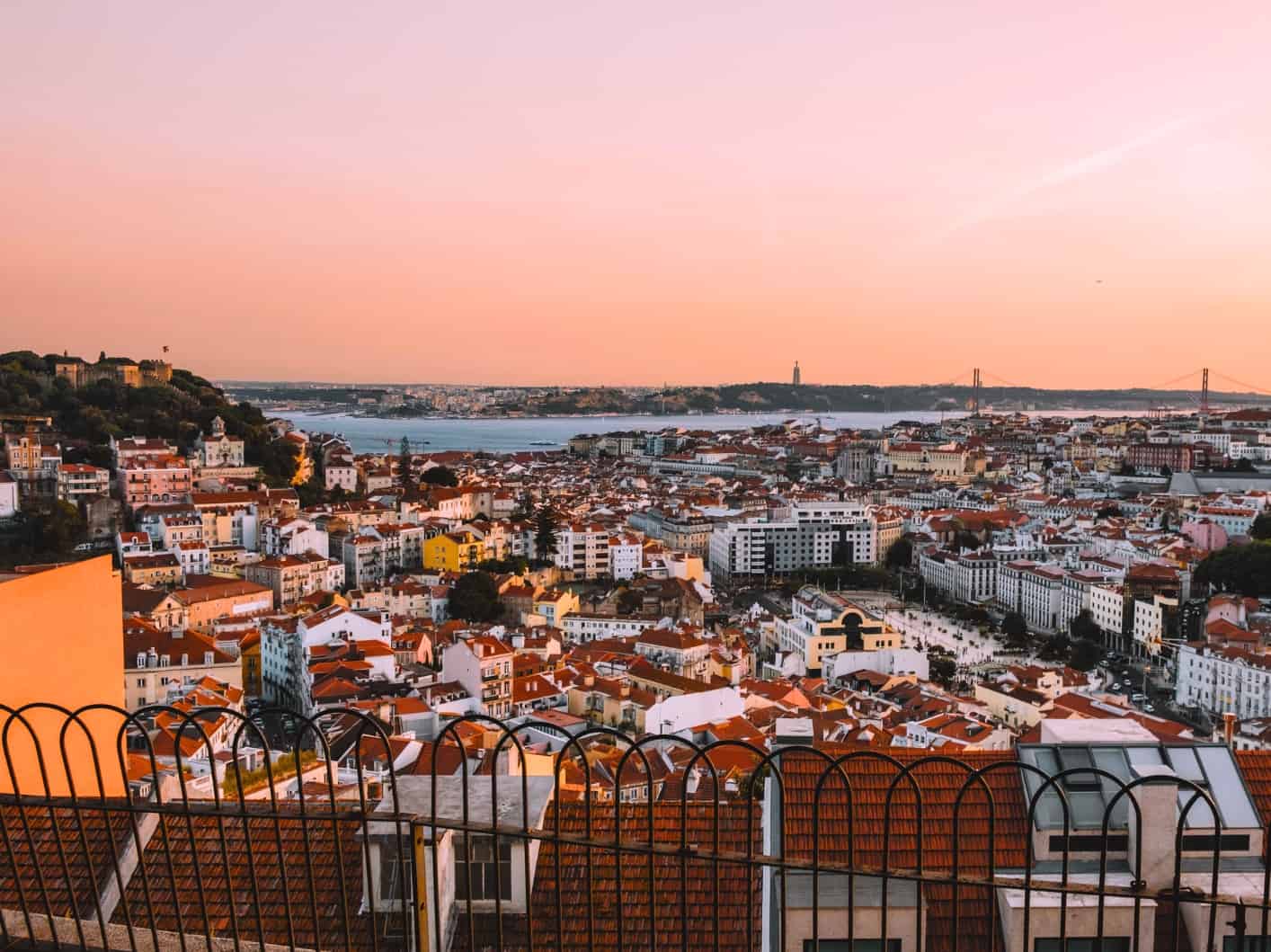 A beautiful Portuguese sunset from the Miradouro da Senhora do Monte in Lisbon. 