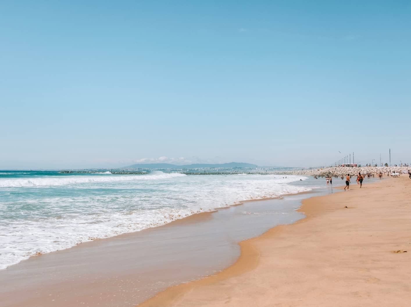The beach in Costa da Caparica. A beach day is a great activity during your 5 days in Lisbon. 