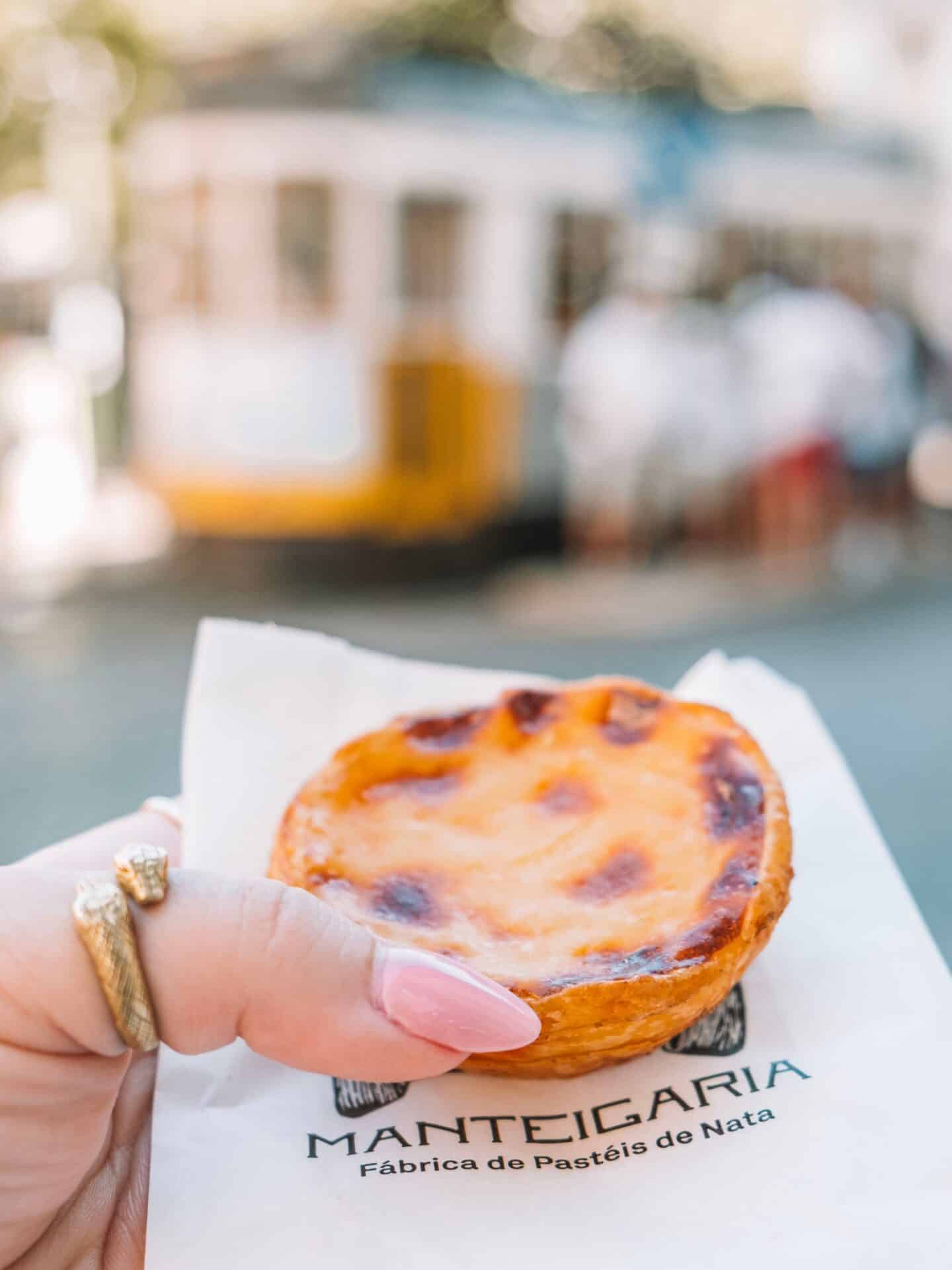 A pastel de nata from Manteigaria! Trying this pastry is a must-do during your 5 days in Lisbon. 