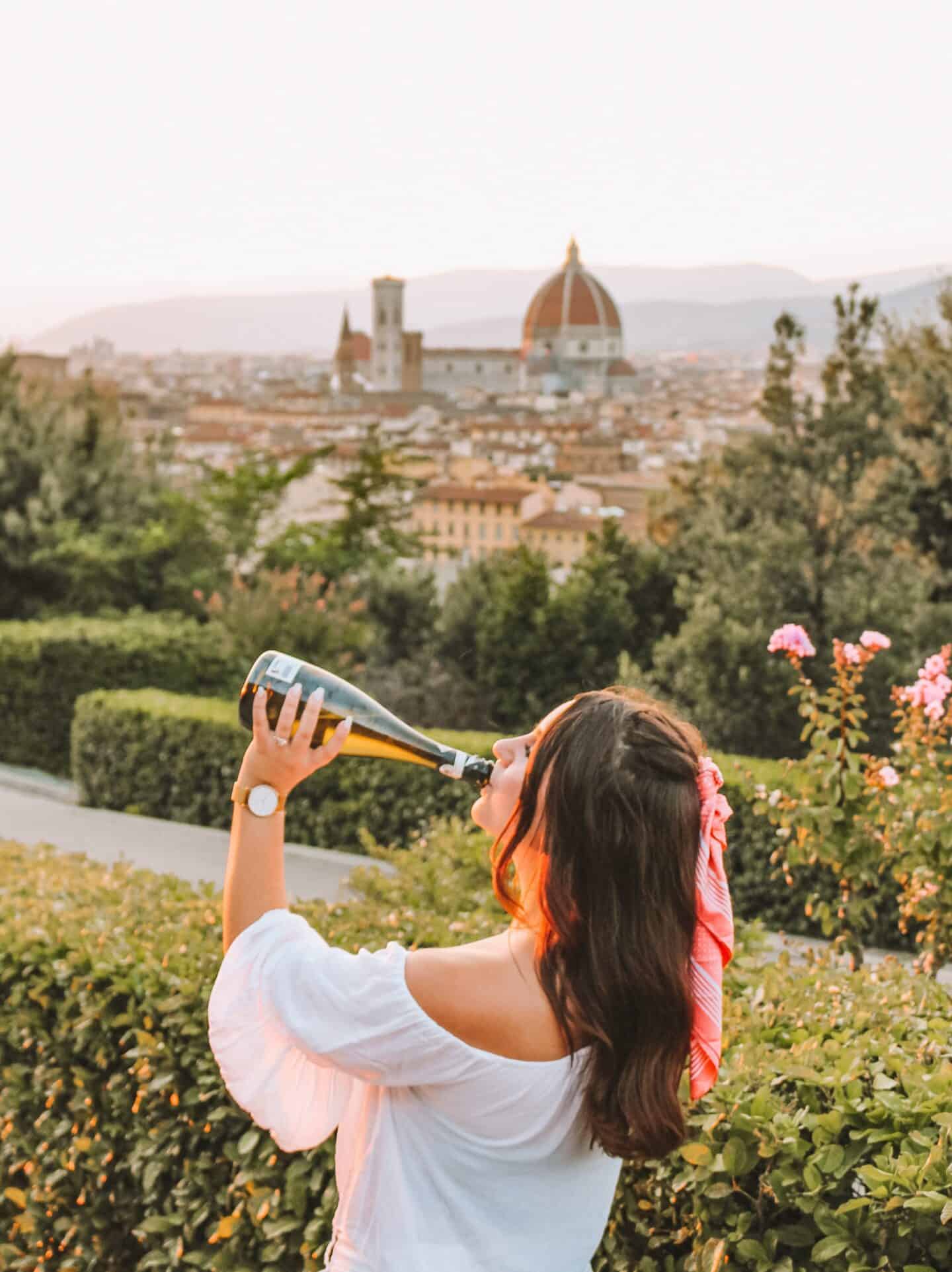 Me sipping prosecco out of the bottle at Piazzale Michelangelo in Florence. 