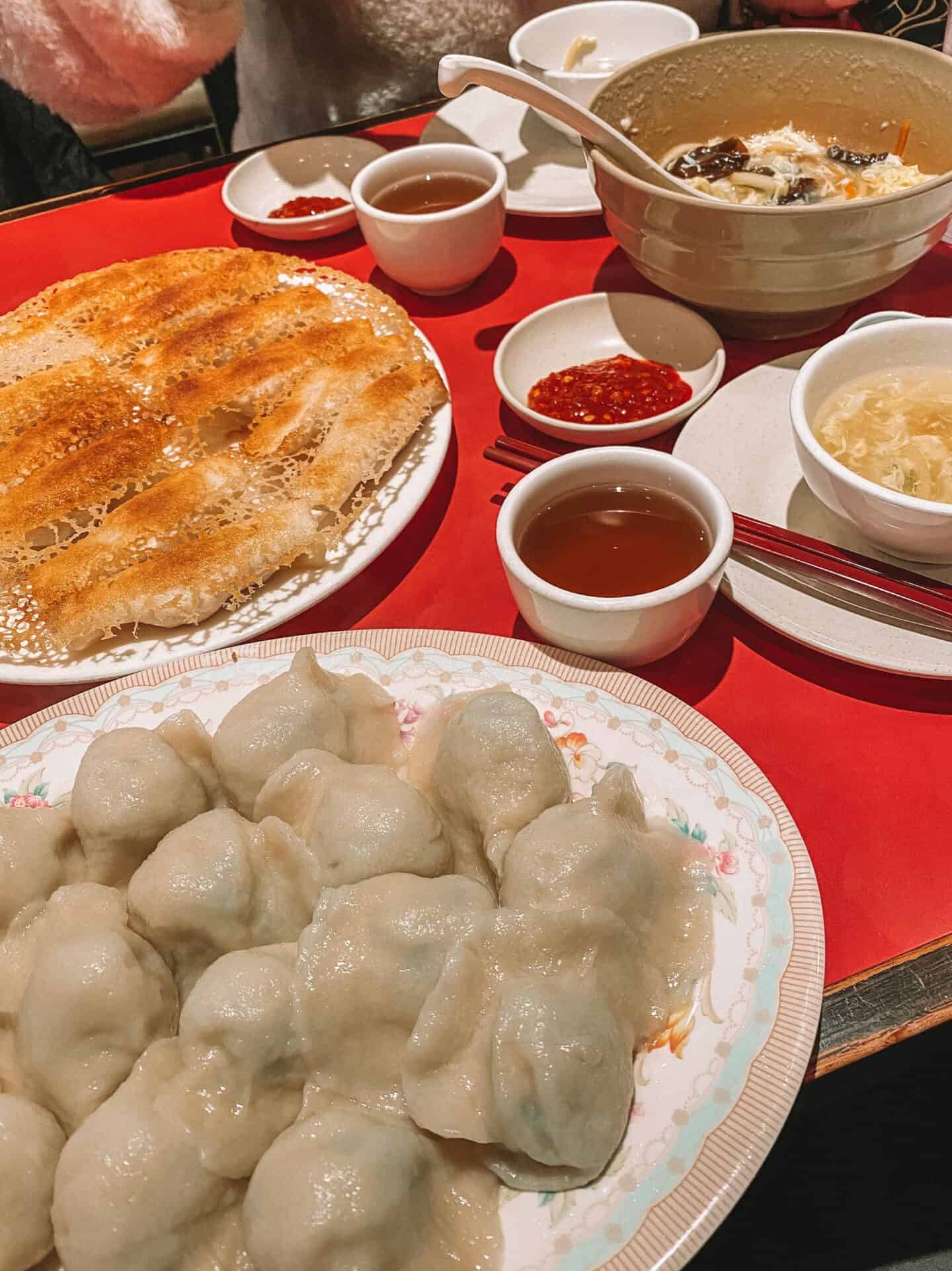 A heap of pan-fried and steamed dumplings from Chinatown's The Dumpling House in Toronto 