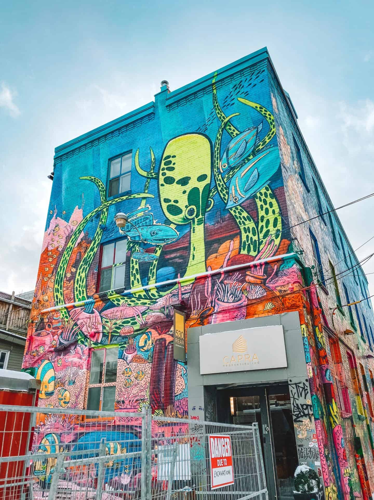 A colorful mural in Toronto's graffiti alley