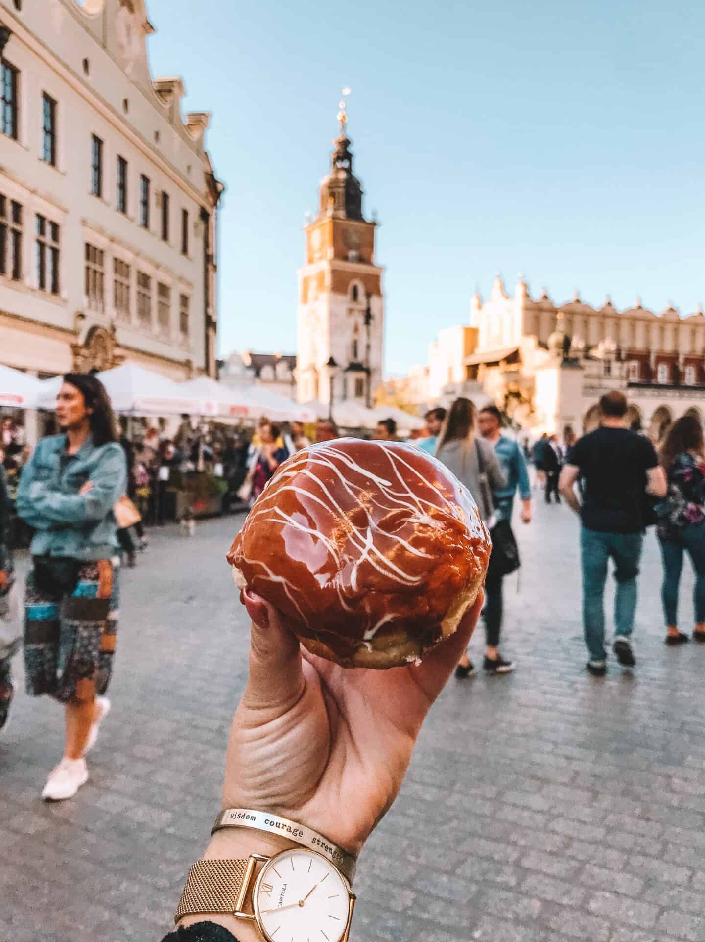 A toffee filled paczki donut in Krakow main square