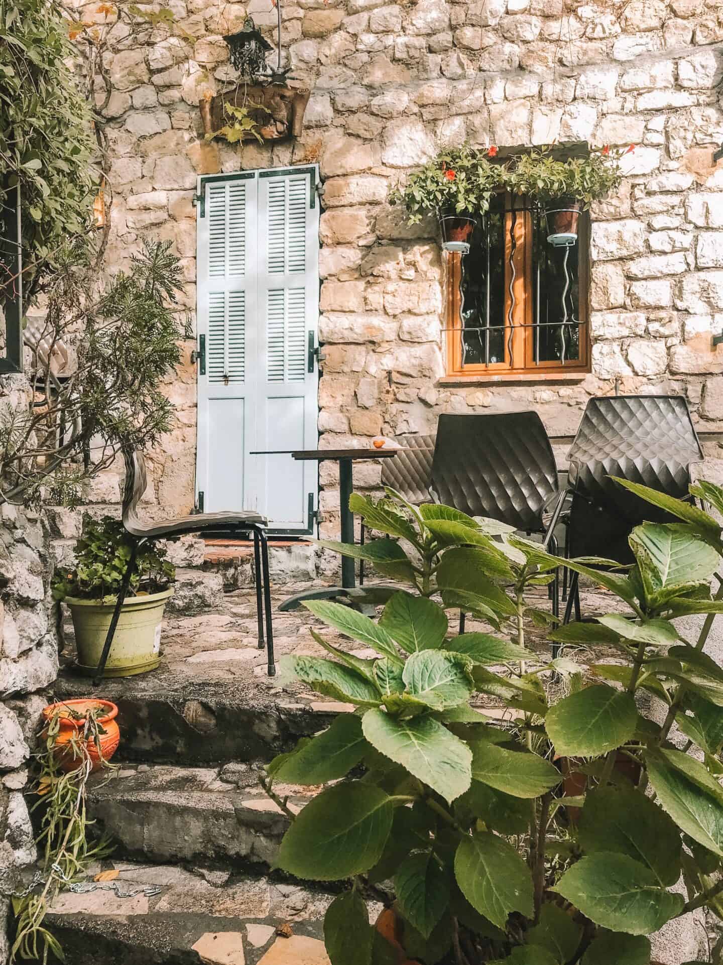 The charming outdoor patio at Deli' restaurant in Eze