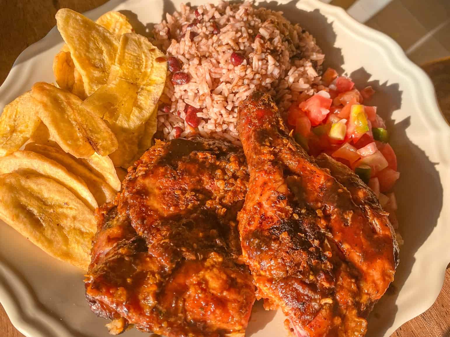 Jerk chicken, pico, rice & beans and fried plantains from Anthony's Chicken – one of the best restaurants in Roatan 