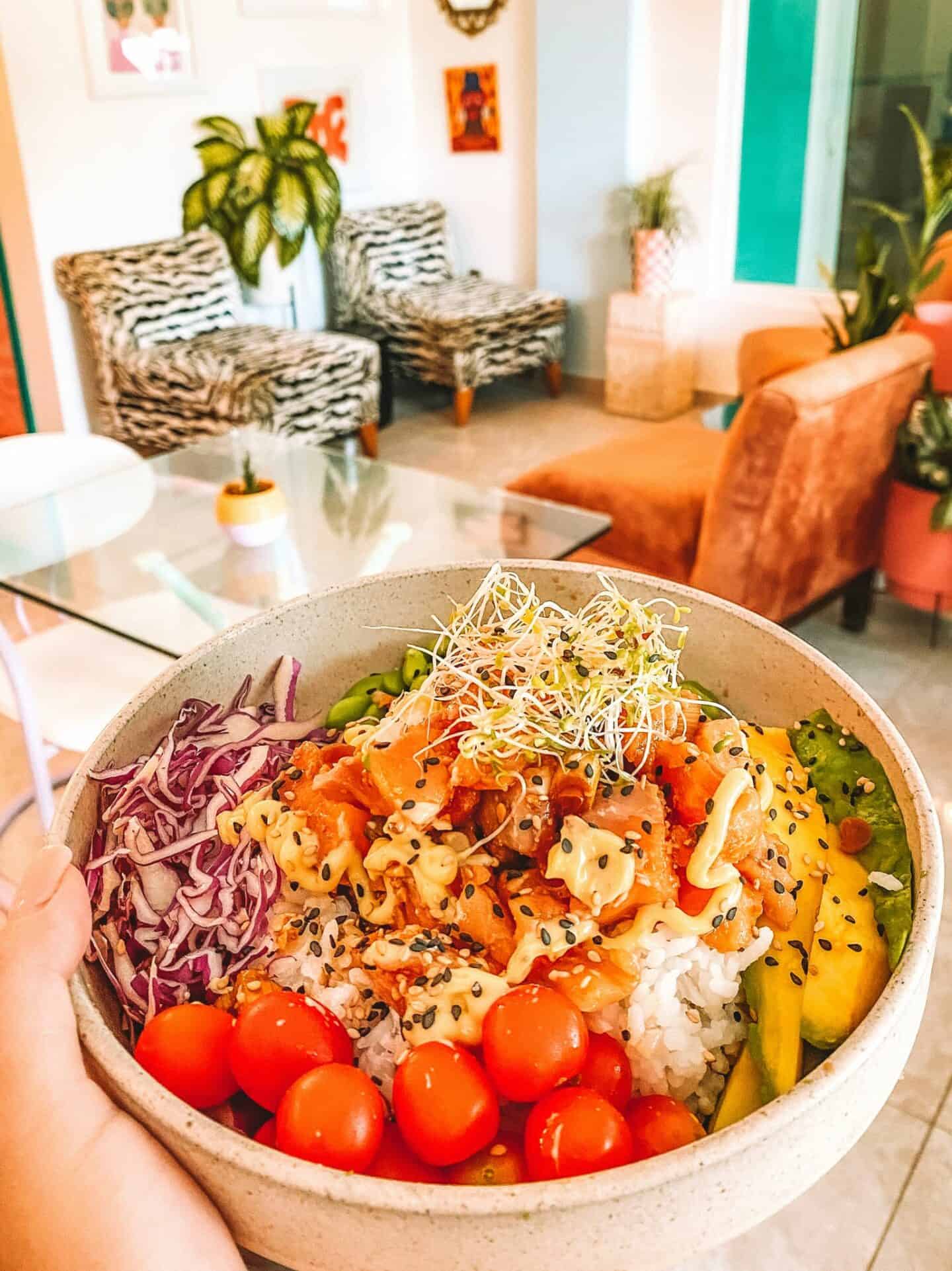 Another poke bowl from Crisp showing the trendy interior of the restaurant
