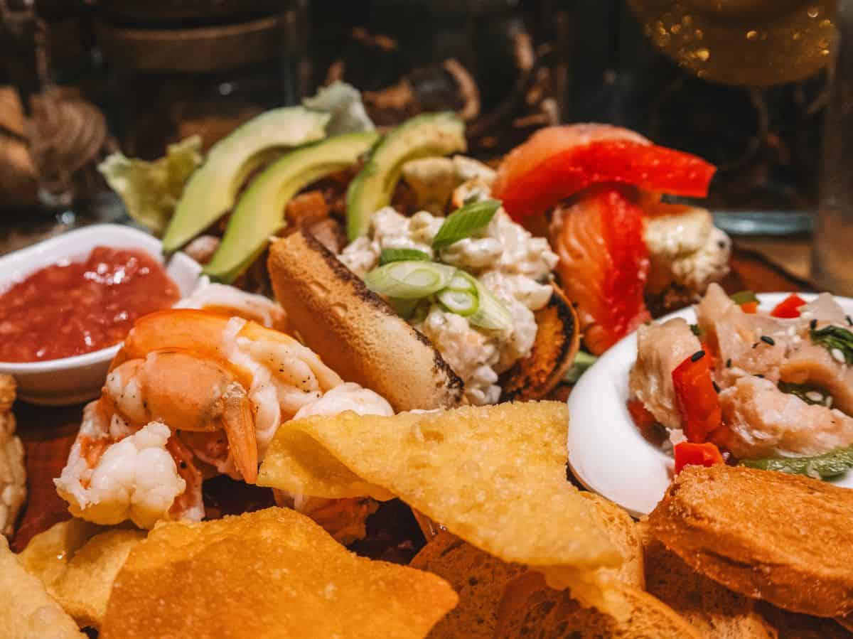 The delicious seafood charcuterie board from Silverside's in West End—piled high with ceviche, grilled shrimp, and even a mini lobster roll. 
