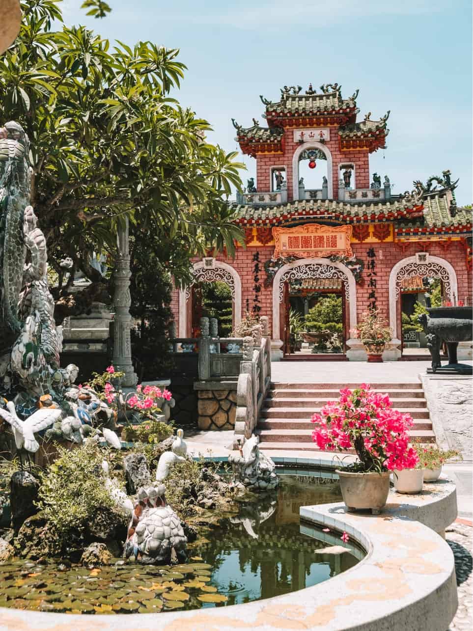 The fountains and front gate of the Phuc Kien Assembly Hall in Hoi An Vietnam. 