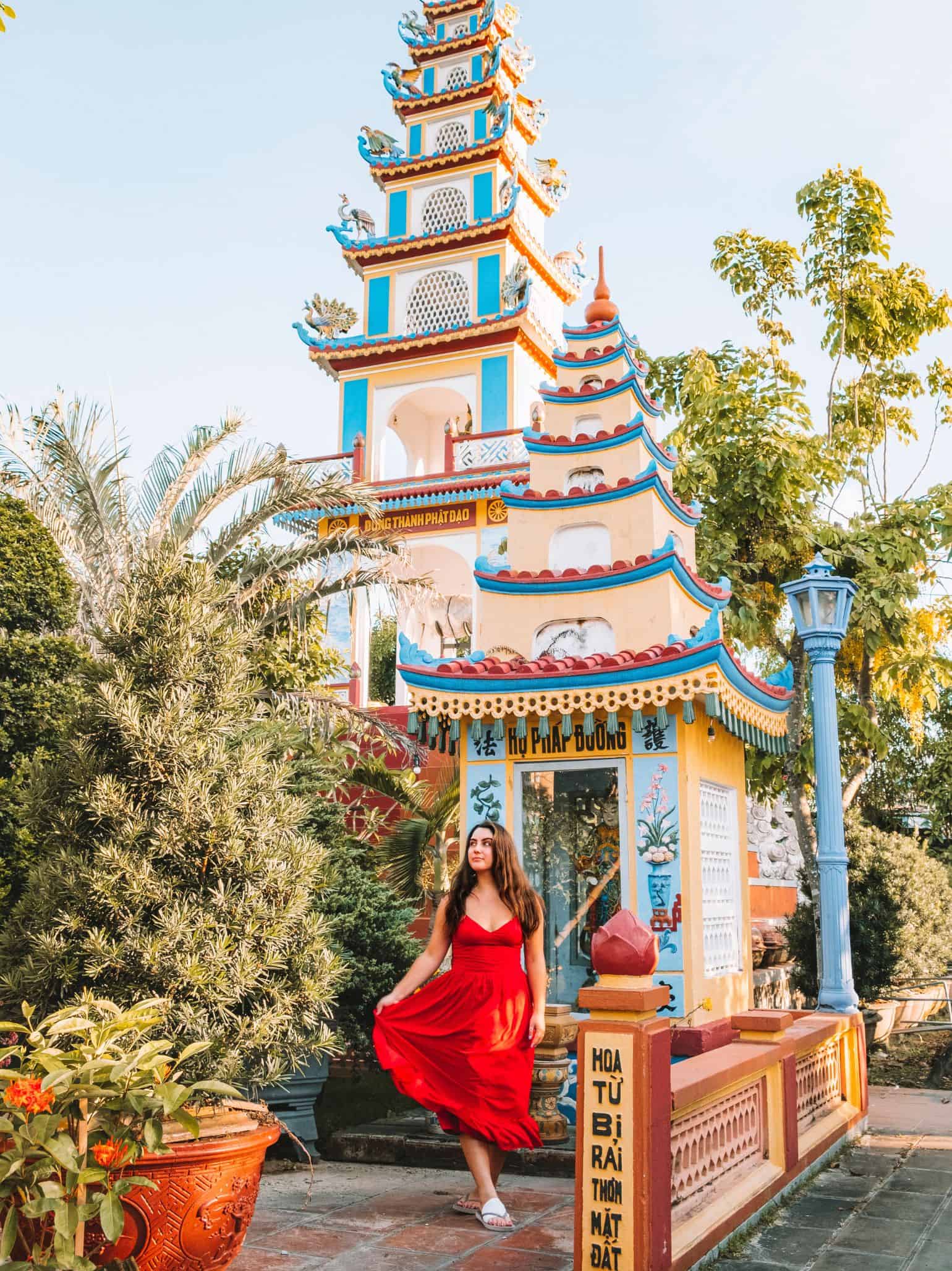 Me walking around the Chua Long Tuyen pagoda in Hoi An in my red dress that was made for me in the city.