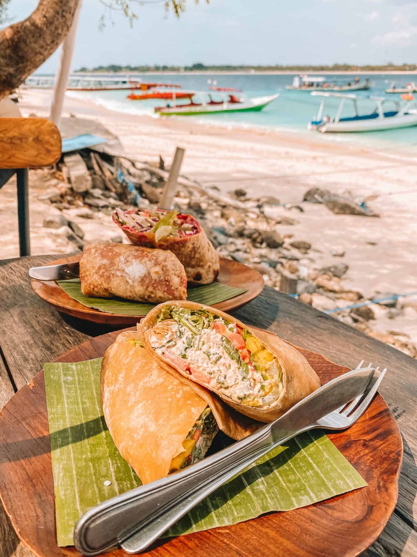 A tasty tuna salad wrap from Kayu Cafe with a great view on Gili Trawangan beach