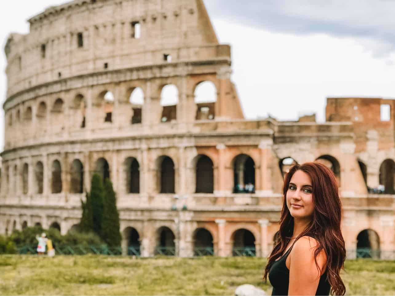 Me in front of the Colosseum – one of the best things to do in Rome in 3 days.