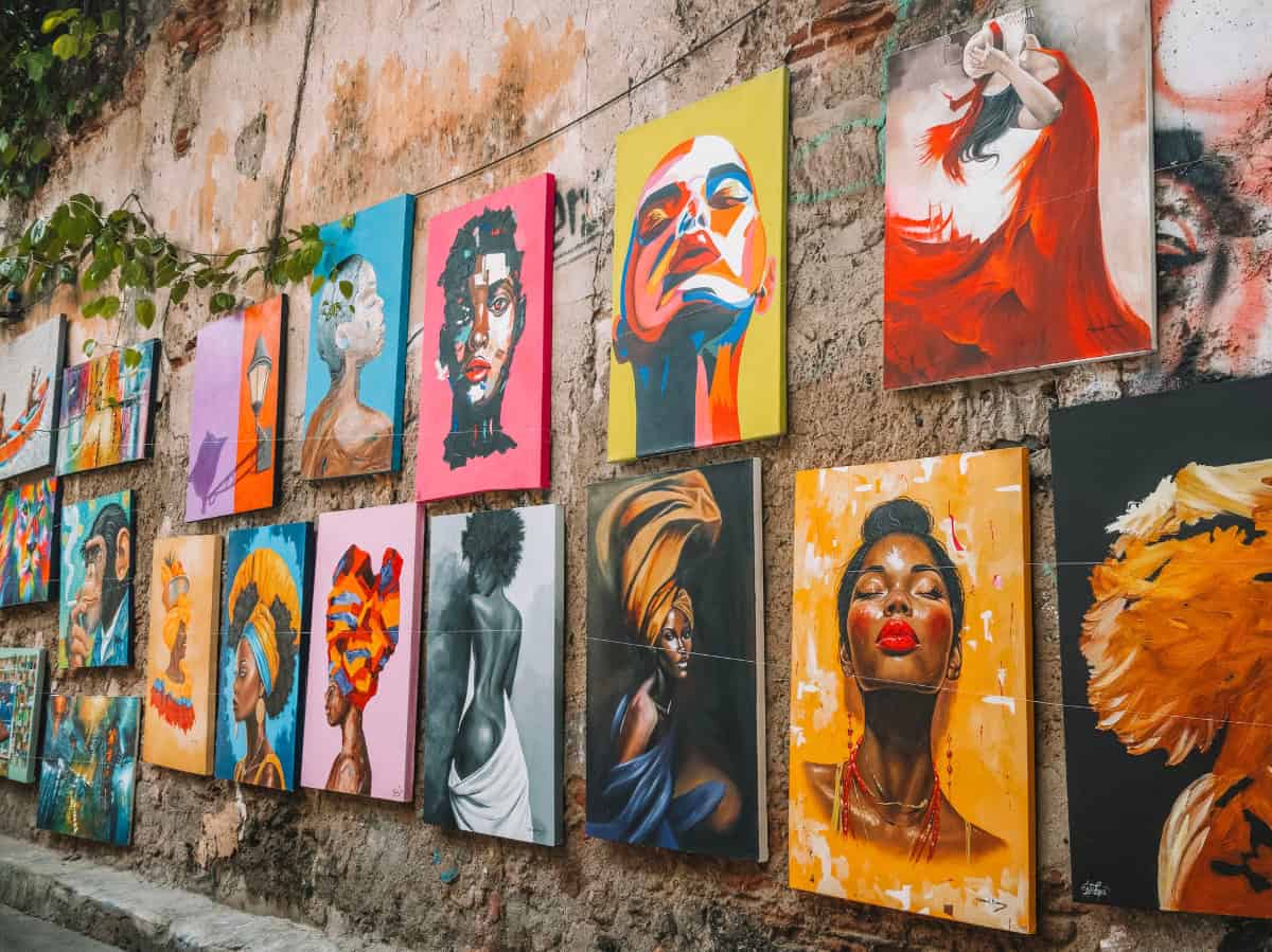 Colorful street art hung on the streets of Getsemani.